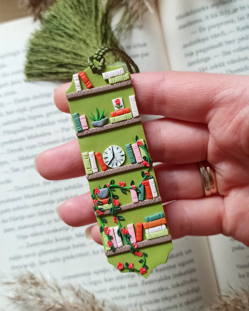 Green tassel bookmark: Handmade polymer clay book mark with small books and plants