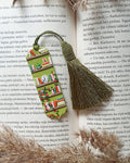 Green tassel bookmark: Handmade polymer clay book mark with small books and plants